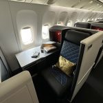 Air India's Bid Upfront program Air India's bidding system for travel class upgrade, how to upgrade economy to business class, perks of flying business class
