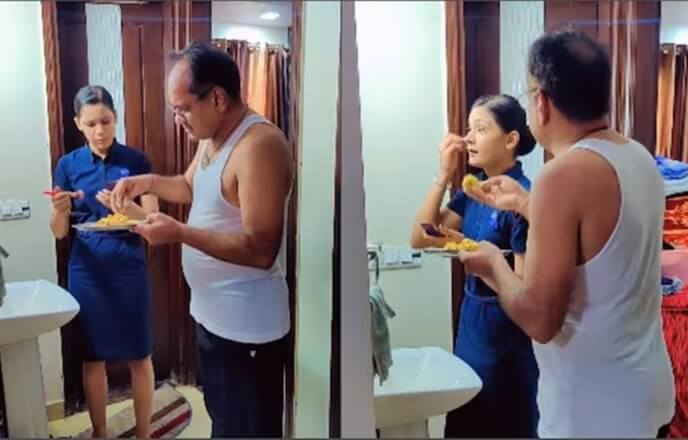 This Indian Father Feeds His Air Hostess Daughter as She Gets Ready for Work. Indeed, India is Changing